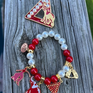 Set von Brosche und Armreif / Delta Delta Delta Brosche , Elefant, 1913, Pyramide