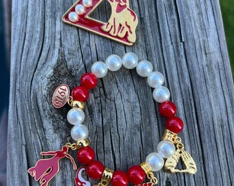 Delta Sigma Theta brooch and bracelet set , elephant, 1913, Pyramid