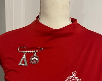 Delta Sigma Theta brooch with shield and pyramid,