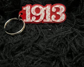1913 Delta Sigma Theta-sleutelhanger | Zomertijd