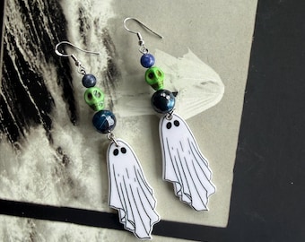 Orecchini spettrali con teschi verdi