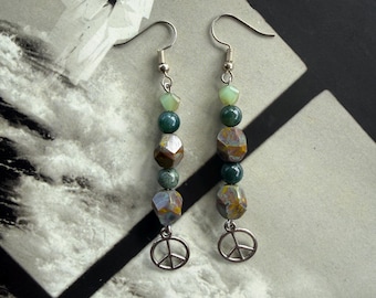 Orecchini con simbolo della pace in omaggio