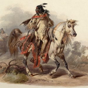 May include: A Native American man on horseback, wearing a feathered headdress and traditional clothing, rides through a landscape with a cloudy sky. The horse is white with a brown mane and tail.