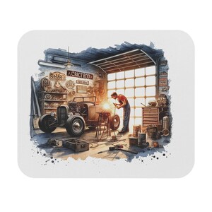 May include: Watercolor illustration of a classic car being worked on in a garage. A person in a red shirt and blue jeans is welding the car. The garage has a large door and various tools and equipment.