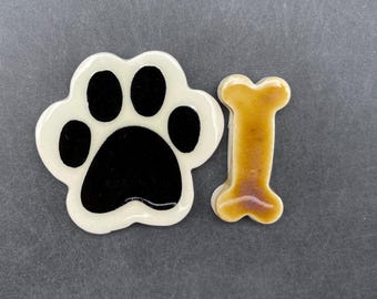 Reserved for Party D. One paw print tile, one bone tile.