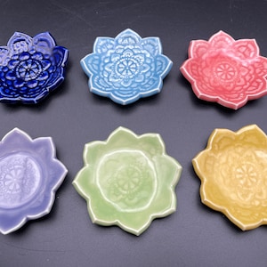 Ceramic lotus flower plates. One handmade ceramic mandala dish. Ring dish, tea bag holder, coin holder, small spoon rest, trinket dish.