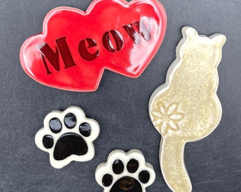 Ceramic paw prints, cat mosaic tile, and “Meow” heart tile. Ceramic tiles. Handmade by Fabulousfungi