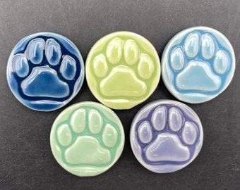 Brightly colored paw print magnets, set of five handmade ceramic fridge magnets with neodymium magnets by Fabulousfungi