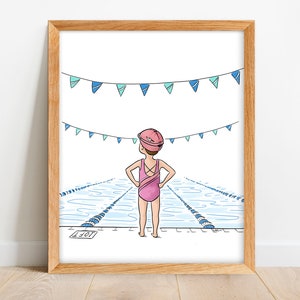 May include: A framed illustration of a swimmer in a pink swimsuit and cap, standing at the edge of a pool. Blue and teal pennants hang above the pool. The artwork is in a wooden frame.