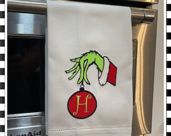 Embroidered Grinch hand with ornament and initial Guest Bathroom Tea Towel kitchen towel