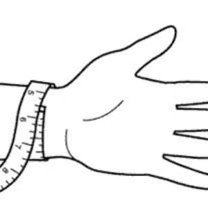 May include: A close-up of a measuring tape wrapped around a person's wrist to show how to measure for a bracelet.