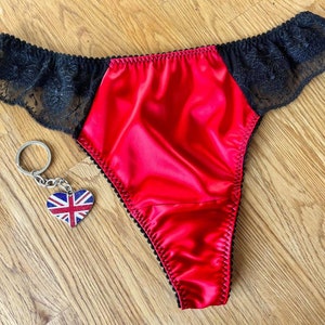 Ladies scarlet red satin & black lace thong in sizes uk8 - uk22 with sheer back by Moonrise Lingerie. Ideal Valentines gift for her.