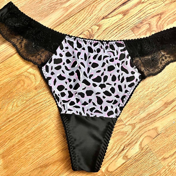 Pink leopard print thong with black boselli Italian satin. Available in sizes UK6 - UK22. Made in UK