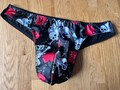 Skull and Bones mens brazillian thong with satin lined gusset and back. Available in size 28”- 38” waist. Also available in other colours