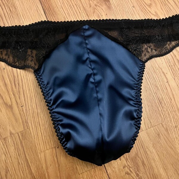 Men’s petrol blue satin & black lace thong. Mens satin thong. Lacy men’s underwear. Available in sizes, S, M,L,XL. Handmade in UK