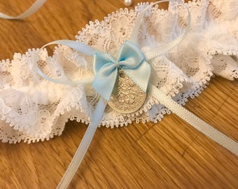 Lucky Sixpence Wedding Garter Something Blue. Keepsake ivory bridal garter with bridal charm. Personalised wedding gift. (Lace may vary).