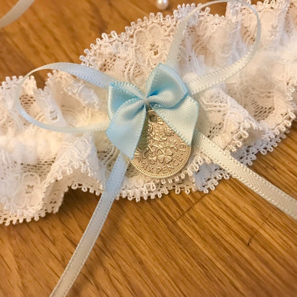 Lucky Sixpence Wedding Garter Something Blue. Keepsake ivory bridal garter with bridal charm. Personalised wedding gift. (Lace may vary).