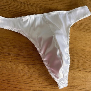Male satin thong. Italian Boselli white satin thong for men. Male panties available in UK size S,M,L & XL.