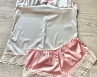 Harmony satin camisole pyjama set in baby pink and ivory. Womens satin lingerie set features cami top & satin boy short - sizes UK8 -UK22