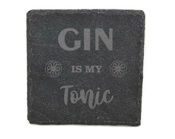 May include: Black slate coaster with the text "GIN IS MY TONIC" and a lemon slice graphic on each side.