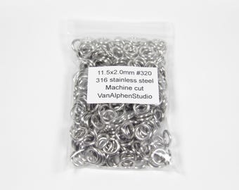 May include: A clear plastic bag filled with numerous small, silver-colored metal rings. A white label displays text: "11.5x2.0mm #320 316 stainless steel Machine cut VanAlphenStudio."