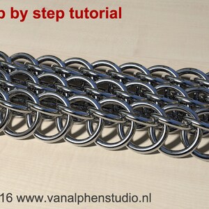 May include: Close-up of a section of chainmail made of shiny, silver metal rings. The rings are interlocked in a repeating pattern. The text "Step by step tutorial" is in red at the top. The website address is at the bottom.