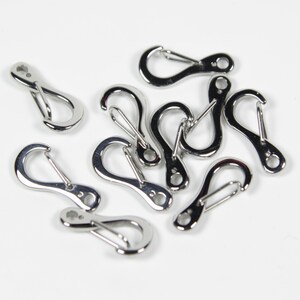 10 st 21 mm nyckelhakespännen i rostfritt stål, tryckspännen, armbandsspännen, nyckelklämmor, paracordspänne, fjäderklämma, hummerklospännen