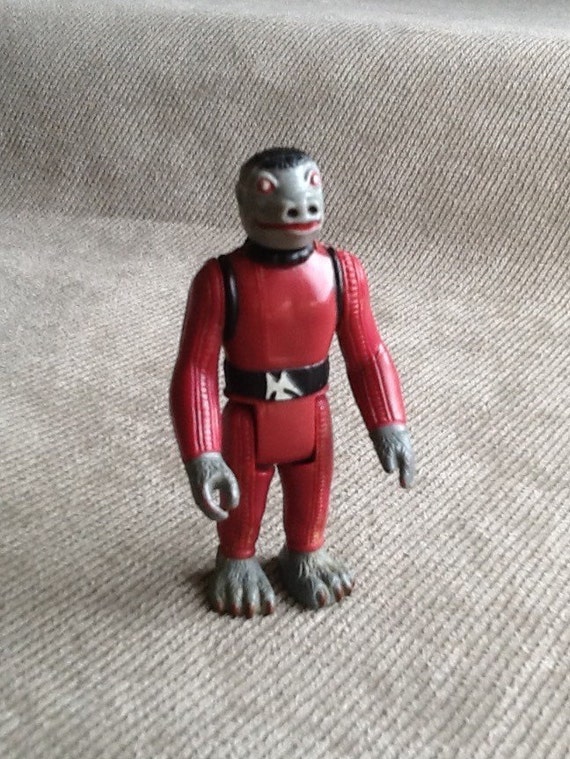 snaggletooth action figure