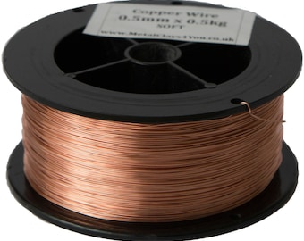 May include: A spool of 0.5mm x 0.5kg soft copper wire. The wire is wound around a black plastic spool.