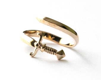 Anillo ajustable de bronce para espada