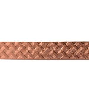 May include: A close-up of a copper-colored metal strip with a woven pattern.