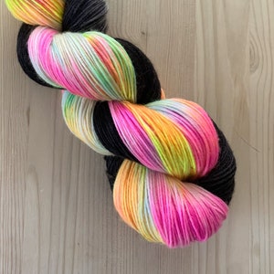 Hand dyed pastel rainbow and black sock yarn Toucan Sam Assigned color pooling yarn image 2