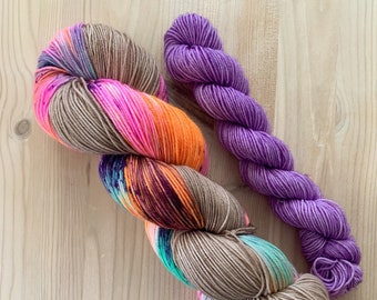 Hand dyed taupe, pink, neon blue, orange and purple speckled sock / fingering weight yarn | Domes