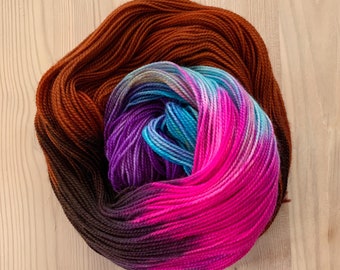 Hand dyed caramel, black, neon blue, hot pink, and electric purple sock yarn - Caramel With A Hint Of Magic