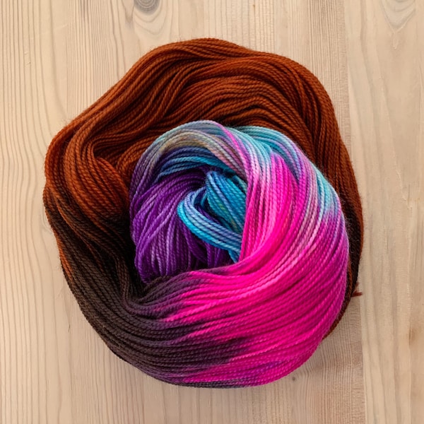 Hand dyed caramel, black, neon blue, hot pink, and electric purple sock yarn - Caramel With A Hint Of Magic