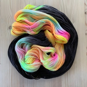 Hand dyed pastel rainbow and black sock yarn Toucan Sam Assigned color pooling yarn image 3