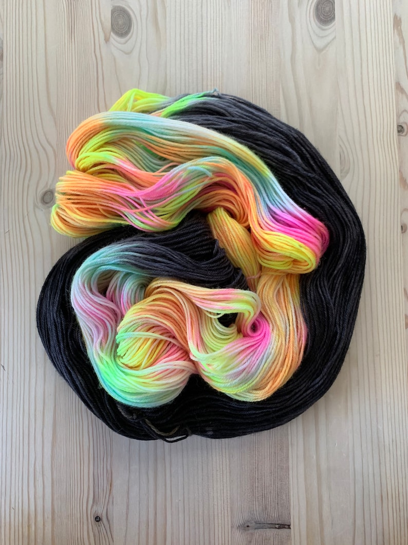 Hand dyed pastel rainbow and black sock yarn Toucan Sam Assigned color pooling yarn image 3