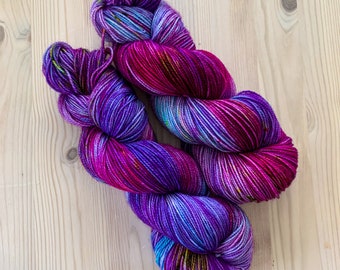 Hand dyed sock yarn, superwash purple, neon blue, red and green yarn - Milky Way