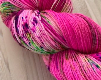 Hand dyed hot pink sock yarn with neon purple  and green speckles| Fluorescent sock yarn - Wondrous Watermelon