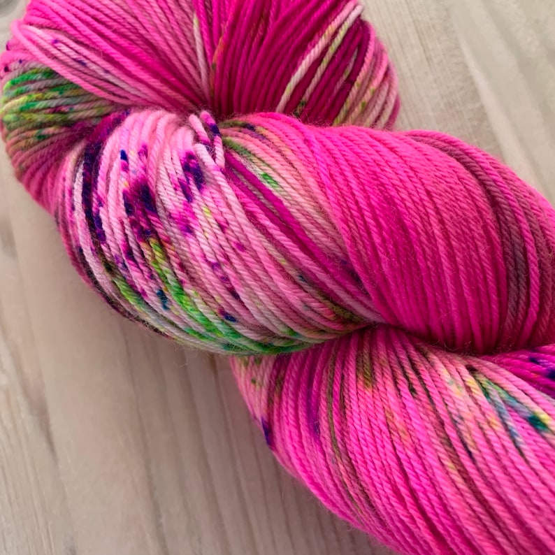 Hand dyed hot pink sock yarn with neon purple and green speckles Fluorescent sock yarn Wondrous Watermelon image 1