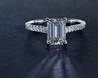 18K white gold emerald cut center diamond ring