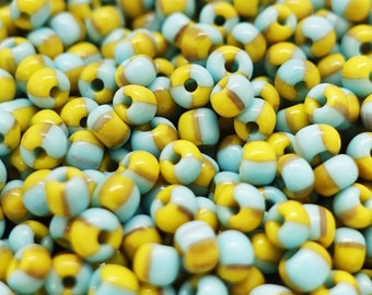 10g Glass seed beads 8/0 (3mm) yellow turquoise STRIPES