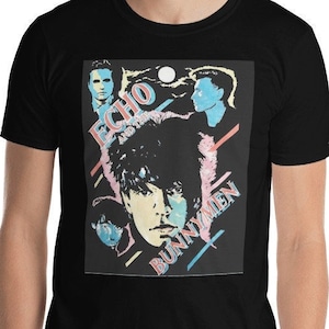 May include: Black t-shirt with a graphic print of the band Echo and the Bunnymen. The graphic features a collage of the band members in a colorful 80s style.
