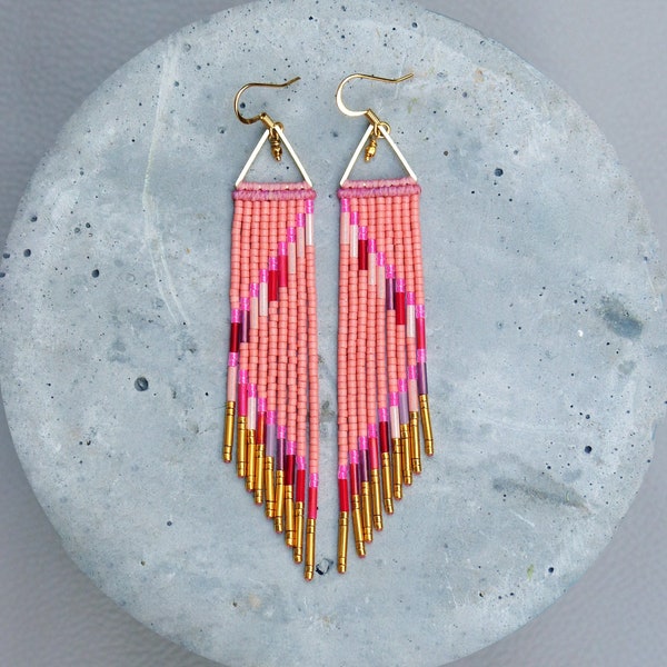 Long beaded fringe earrings in shade of salmon pink and red