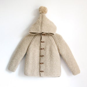 Hand Knitted unisex kids wool hoodie cardigan/Jacket, Chunky, Duffel Coat, Raglan with pom pom, picture color sand beige