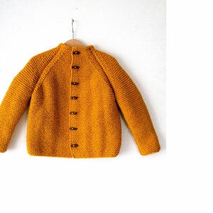 Hand knitted unisex kids, baby/toddler wool cardigan/jacket, chunky, Duffel Coat, long raglan sleeves , wooden buttons, choose your color