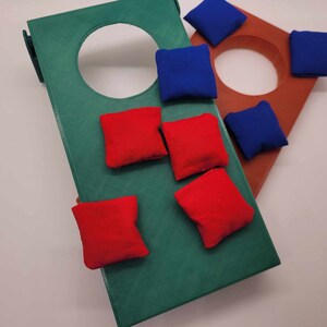 Mini Cornhole-påsar: 1,5 tums röd och blå bönpåse-kast