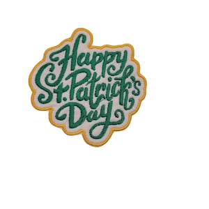 May include: Green and yellow embroidered patch with the text "Happy St. Patrick's Day" in a cursive font.