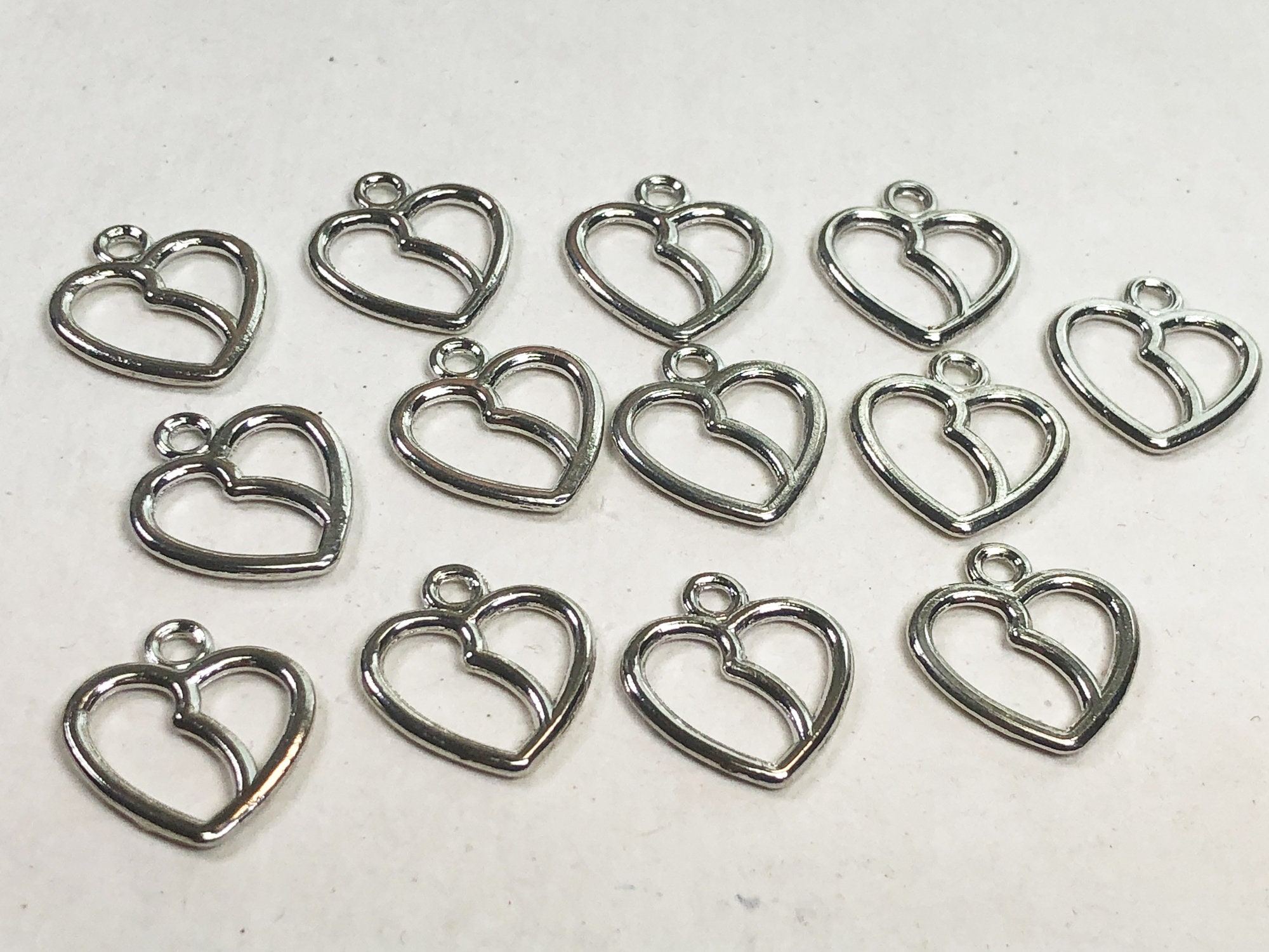 Silver heart charms discount