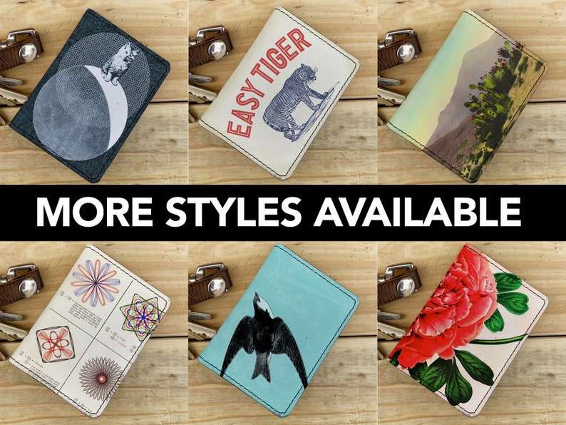 May include: Six different leather card holders with various designs. The designs include a moon and stars, a tiger, a desert landscape, a geometric pattern, a bird, and a flower.
